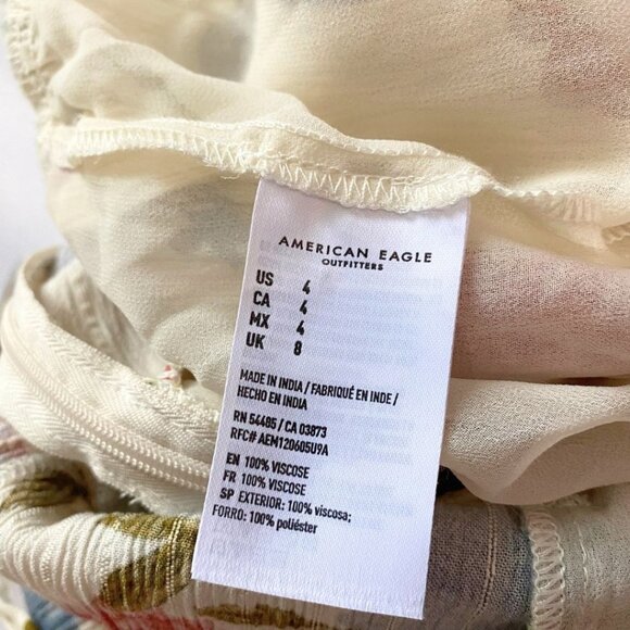 AMERICAN EAGLE AEO WHITE BLUE FLORAL SURPLICE BELTED WIDE FULL SLIT LEG JUMPSUIT - Picture 11 of 11